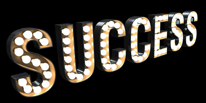 The word success in lights